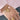hand med armband med berlocker av naturmotiv