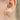 ornament-orhangen-smycken-studs-ring-vit-poalit.jpg