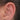 Piercingsmycke i guld med motiv av en lie.