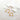 ornament-piercing-guld-hastsko-circular-barnell-ring-med-kulor.jpg
