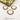 ornament-piuercingsmycke-guld-clicker-svarta-kristaller.jpg