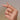 hand smyckad med flera guldringar.